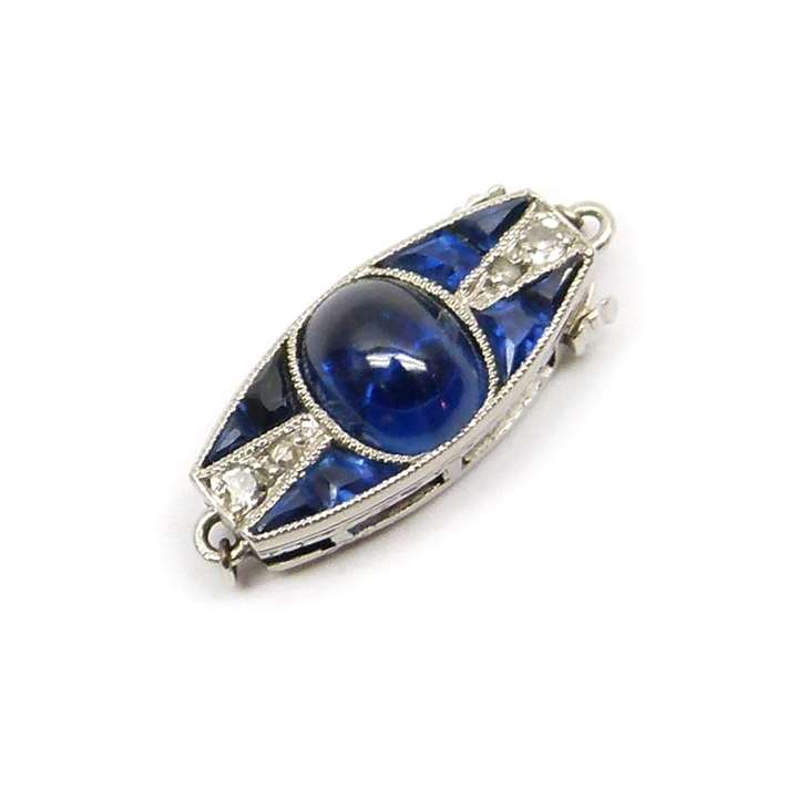 Early 20th century cabochon sapphire and diamond cluster clasp, with fittings for a single row